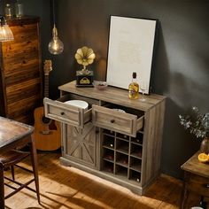 a room with a wine rack, table and chairs