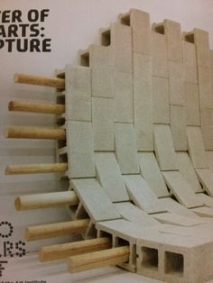 a magazine cover with an artisticly designed chair made out of blocks and plywood sticks