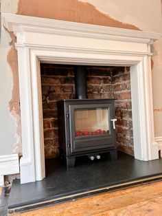 Woodburner 
wood burning stove 
British made Woodburner Brick Fireplace, Woodburning Stove Fireplace Ideas, Woodburner Fireplaces, Stove Surround, Thatch House, Wood Fireplace Inserts, Woodburning Stove Fireplace, Wood Burner Fireplace, Log Burner Living Room