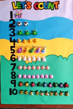 a bulletin board with numbers and animals on it