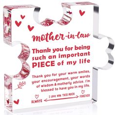 a piece of glass with the words mother - in - law on it and hearts