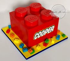 a lego cake with the words gopher written on it's front and side