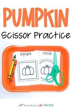 an orange tray with scissors and paper on it that says pumpkin scissor practice