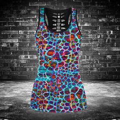 Leopard Skin Colorful Abstract Hollow Tank Top Or Legging All of our Leggings and Hollow Tank Top are custom-made-to-order and handcrafted to the highest quality standards. Each pair of leggings and hollow tank top is constructed with a high quality 82% polyester, 18% spandex blend. Premium fabric offers unmatched comfort and breath-ability while remaining strong and durable for everyday use. Features a specialty high definition heat-dye application that ensures long lasting color vibrancy even Multicolor Racerback Activewear For Summer, Multicolor Stretch Top For Yoga, Stretch Multicolor Top For Yoga, Multicolor Stretch Racerback Tops, Stretch Multicolor Yoga Top, Multicolor Sleeveless Activewear For Gym, Casual Multicolor Racerback Activewear, Multicolor Sleeveless Gym Tops, Multicolor Stretch Racerback Activewear