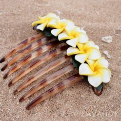 Always designed in Hawaii at Lavahut! Pretty Plumeria Hair Comb  #madewithlove #bridalhair #hawaiianhair #hairaccessories #tropicalhairclip #hairclip #flowerhairclip #madeinhawaii #designedinhawaii #flowerclip Hawiian Flower, Beach Wedding Flip Flops, Hawaii Hair, Flower Hair Piece, Curly Hair Photos, Unique Bride