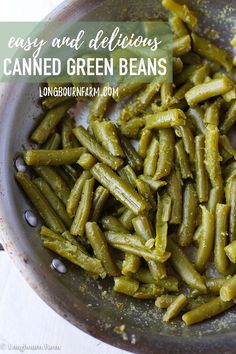 green beans are being cooked in a pan with the words easy and delicious canned green beans