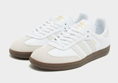 Lace up in a legendary style with these men's Samba OG trainers from adidas Originals. In a JD-exclusive White and Alumina colourway, these treads have a premium leather upper with a signature suede T-toe cap for lasting wear. They have a tonal lace fastening with a low-profile ankle collar for a locked-in fit, and a lightly padded sole for essential comfort. They sit above a grippy gum rubber tread for traction, and are finished with adidas' iconic 3-Stripes to the sidewalls and Trefoil branding throughout. | JH6478 Adidas Samba White, Clothes Pieces, Baby Clothes Sale, Kids Clothes Sale, 270 Nike, Nike Boots, Digital Closet, Nike Metcon, Girly Shoes