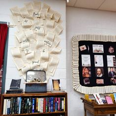 there are many books on the shelves in this room and one has a bulletin board attached to it