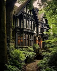 a house in the woods with stairs leading up to it