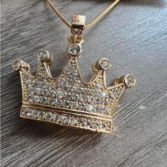 Cz Crown Shaped Pendant Necklace. Gold Crystal Crown Shaped Jewelry, Gold Crystal Crown Jewelry, Crystal Crown Jewelry For Gifts, Elegant Gold Iced Out Rhinestone Necklace, Crown Shaped Rhinestone Jewelry For Gifts, Pink Sapphire Pendant, Flower Choker Necklace, Gold Coin Necklace, Agate Pendant Necklace