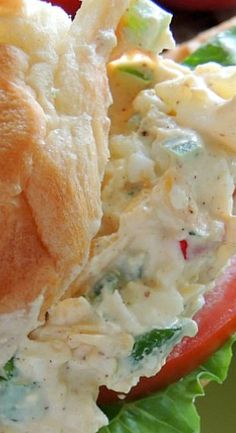 a close up of a sandwich with chicken salad on it