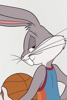 an animated rabbit holding a basketball ball