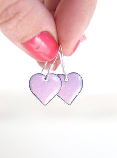 These beautiful pink heart earrings handmade with enamel on copper would make a lovely girl friend gift this Galentines day. The baby pink earrings measure approximately 13mm in diameter and are fired using pastel pink enamel which creates a subtle glazed finish. The copper earrings are backed with counter enamel to insure comfort and strength. They come complete with 925 Sterling silver earring wires. All jewellery comes packed in a quality iamrachel box, just add a bow and they're ready for gi Small Pink Earrings For Gifts, Pink Hand Painted Heart Jewelry, Everyday Hand Painted Pink Earrings, Pink Heart-shaped Nickel-free Earrings, Pink Heart-shaped Everyday Earrings, Pink Heart Earrings For Everyday, Hypoallergenic Heart-shaped Pink Earrings, Hypoallergenic Pink Heart Earrings, Pink Enamel Earrings For Gift