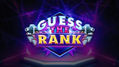 guess the rank logo on stage with purple and blue lights behind it, which reads guess the rank