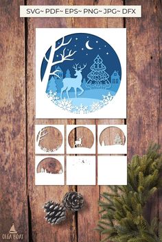 paper cut christmas scene with reindeer and trees