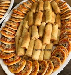 there are many different types of food on this platter, but it looks like they were made from bread rolls