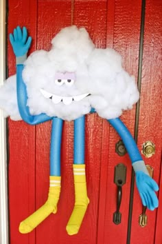 a door with a fake cloud on it