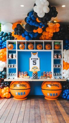 a basketball themed birthday party with balloons and decorations