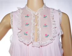 "Adorable 60s/70s pink night gown with lace trim and embroidered flowers. *Size = Large *Length = 53.5\" *Chest = 20\" *Hip = 24.5\" *Fabric = label is unreadable, but it is likely nylon. *Brand = JCPenney In good vintage condition, with the light wear you would expect from an item this age. As with all vintage items, please understand this has been previously loved and some wear may be present. I always do my best to accurately photograph and describe the item, but always purchase with the know Pink Night Gown, Angel Bunny, Long Nightgown, Fabric Labels, Women's Nightgowns, Bees Knees, Nightgowns, Pretty Pastel, Pink Velvet