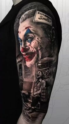 a man with a tattoo on his arm that has a clown face and the words don't stop