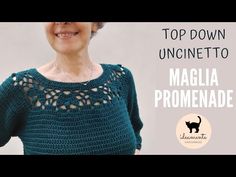 a woman wearing a green crochet sweater with the words top down unicinetto