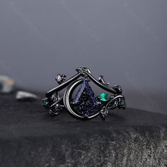 Kite Black Gold Sandstone Engagement Ring Set,Marquise Amethyst Emerald Ring,Women Bridal Set,Unique Twig Anniversary Promise Ring Gift Radiant Jewelry takes pride in offering handcrafted engagement rings that undergo rigorous quadruple-checks to ensure the highest quality. PRODUCT INFORMATION >Metal: SOLID 10K / 14K / 18K GOLD /S925 (can be made in white/rose/yellow gold) >Main Stone *Center Stone: Blue Sandstone *Size & Shape: 7x10mm Kite Cut >Side Stones: *Center Stone: Lab Emerald & Amethyst Mystical Black Ring As Gift, Unique Black Crystal Gemstone Ring, Black Rings With Gemstone Accents As Gift, Black Rings With Gemstone Accents For Gift, Mystical Black Ring Jewelry, Black Mystical Style Jewelry Ring, Black Mystical Ring Jewelry, Magical Gemstone Crystal Promise Ring, Gothic Gemstone Jewelry For Promise Ring