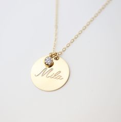 Personalized large circle disk tag necklace in Gold filled or Sterling silver. Have this custom necklace personalized with your child's name, your name, initials or any meaningful word of your choice. This necklace is perfect for a special meaningful keepsake gift for mom, friend wife or that special someone. OPTIONS Material: SS// for Sterling silver GF// for Gold filled Disk size : 16mm // 19mm Cubic Zirconia charm: You can choose from the drop down bar menu to add a 4mm CZ charm PLEASE READ B Customizable Minimalist Charm Necklace For Personalized Gift, Minimalist Customizable Charm Necklaces For Personalized Gifts, Minimalist Customizable Charm Necklace For Personalized Gift, Minimalist Personalized Necklace For Everyday, Everyday Personalized Minimalist Custom Necklace, Everyday Minimalist Personalized Necklace, Personalized Nameplate Necklace For Everyday, Dainty Personalized Charm Necklaces With Round Pendant, Round Pendant Name Necklace For Personalized Gift