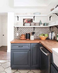 the kitchen counter is clean and ready to be used for cooking or serving food on