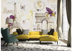 the living room is decorated in yellow and grey colors with an eiffel tower mural