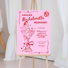 a pink sign with the words bachelor weekend written on it and a red bow around its neck