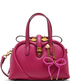 From Betsey Johnson, this handbag features:PU exteriorGold-tone hardwareTurnlock and zipper closureInterior back wall zipper pocket2 interior front wall slip pocketsMetal bow hang-off charmTop handle drop approx. 6",  strap drop 22" Removable crossbody strap Approx. 9" L x 4.25" D x 6" HImported. Heart Pump, Family Women, Bow Bag, Front Wall, Perfume Gift Sets, Heart Beat, Karl Lagerfeld Paris, Wallet Accessories, Satchel Bag