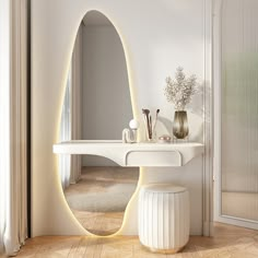 a white table and mirror in a room