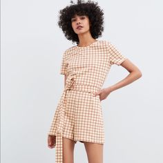 Zara Nwt Plaid Jumpsuit W/ Wrap Around Tie Belt Size S . Round Neck. Back Zipper Closure. 100% Cotton. Zara Beige Jumpsuits And Rompers For Summer, Fitted Beige Zara Jumpsuits And Rompers, Gingham Romper, Plaid Jumpsuit, Zara Jumpsuit, Windowpane Plaid, Playsuit Romper, Zara Pants, Fabric Belt