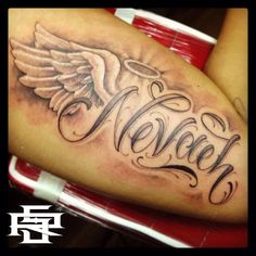 a woman's arm with an angel and the word never written on it in cursive writing