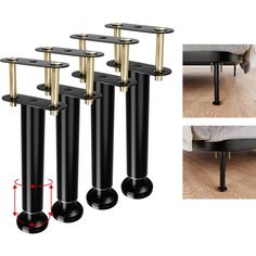 four black and gold metal poles on the floor