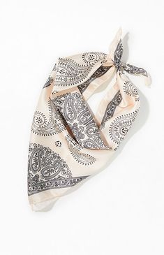 Add a touch of sophistication to your look with the Ivory Tie Bandana Scarf rom LA Hearts. Featuring a classic bandana print and an adjustable tie scarf design, this accessory is crafted from silky woven fabric for a smooth, elegant finish.Bandana printAdjustable tieSilky woven fabricOne size fits most LA Hearts Womens Ivory Tie Bandana Scarf Bandana Around Neck, Tie Bandana, Silk Bandana, Tie Scarf, Bandana Scarf, Bandana Print, Scarf Design, Pacsun, Woven Fabric