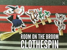 the room on the broom clothespin is decorated with cats, witches and other stickers