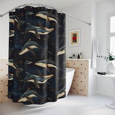 a bathroom with a shower curtain that has dolphins in the water and stars on it