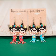 The Dancing Frida Kahlo beaded earring will elevate your outfit with fun and flare!Hand-beaded in Guatemala. Sold in assorted colors, email us at customerservice@luciasimports.com with any preferences. Multicolor Bead Cap Drop Earrings, Multicolor Beaded Dangle Earrings With Bead Caps, Multicolor Beaded Dangle Earrings, Multicolor Drop Earrings With Bead Caps, Elevate Your Outfit, Clothing Blogs, Beaded Earring, Garden Journal, Novelty Items