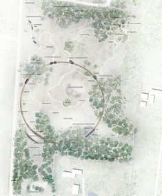 an aerial view of a circular park with trees