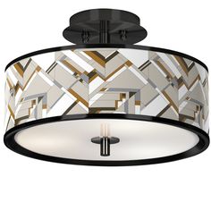 a semi flush ceiling light with an art deco design on the drum and two lights