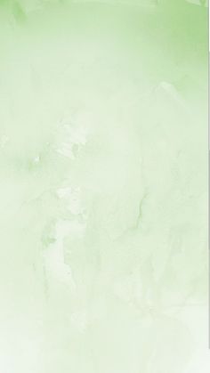 an abstract green background with white and black lines on the bottom right hand corner, as well as light green watercolor paint