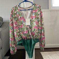 Gorgeous Floral Long Sleeve V-Neck Bodysuit. Clasp At Chest For Secure Fit And Double Snap Closure Underneath! It’s Even Got Gold Metallic Threading In It! Great For Spring And Summer! Size Medium Blouse Bodysuit, Bodysuit Blouse, V Neck Bodysuit, Threading, Floral Blouse, Snap Closure, Top Blouse, Womens Tops, Size Medium