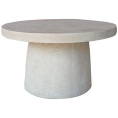 a white table with a round base on it's side, against a white background