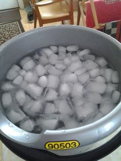 an ice bucket filled with lots of ice