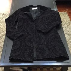 Size M. Euc. Gorgeous Black Smoking Style Jacket. No Pockets. No Closure. Lined. Velvet Trim, Ornate Thread Pattern Design. Festive Silvery Look. Disneybounding Haunted Mansion Look. Laying Flat Armpit To Armpit Is Approximately 18 Inches, 35 Inches In Length. Very Chic. Patterned Jacket, Thread Pattern, Velvet Trim, Haunted Mansion, Jacket Pattern, Mansion, Pattern Design, Jackets & Coats, Thread