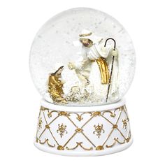 a snow globe with an image of the nativity scene in it