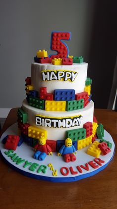 a birthday cake made out of legos with the number five on it's side