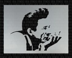 a stencil of a man's face is shown in black and white