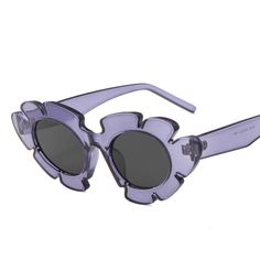 Look chic and eye-catching with the Vintage Flower Cat Eye Sunglasses. Featuring an alluring cut-out flower design and + more colors to choose from, these stylish sunglasses will add vibrancy and elegance to your look. Purple Cat Eye Sunglasses For Summer, Summer Purple Cat Eye Sunglasses, Purple Cat Eye Sunglasses For Spring, Modern Purple Sunglasses For Spring, Chic Glass Cat Eye Sunglasses For Spring, Trendy Glass Cat Eye Sunglasses For Spring, Spring Beach Cat Eye Sunglasses In Plastic, Spring Beach Cat Eye Plastic Sunglasses, Trendy Cat Eye Sunglasses For Spring